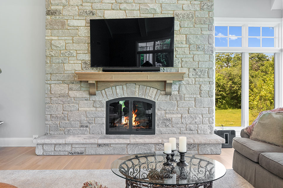 Northfield-Custom-Home-101 - Sun Room Fireplace - Globex Developments Custom Homes